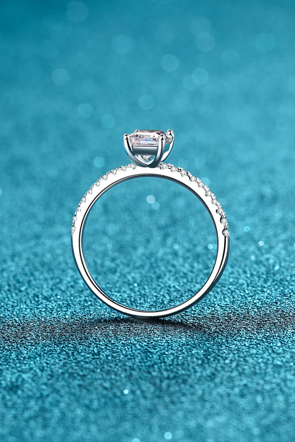Emerald Cut 4-Prong Moissanite Ring