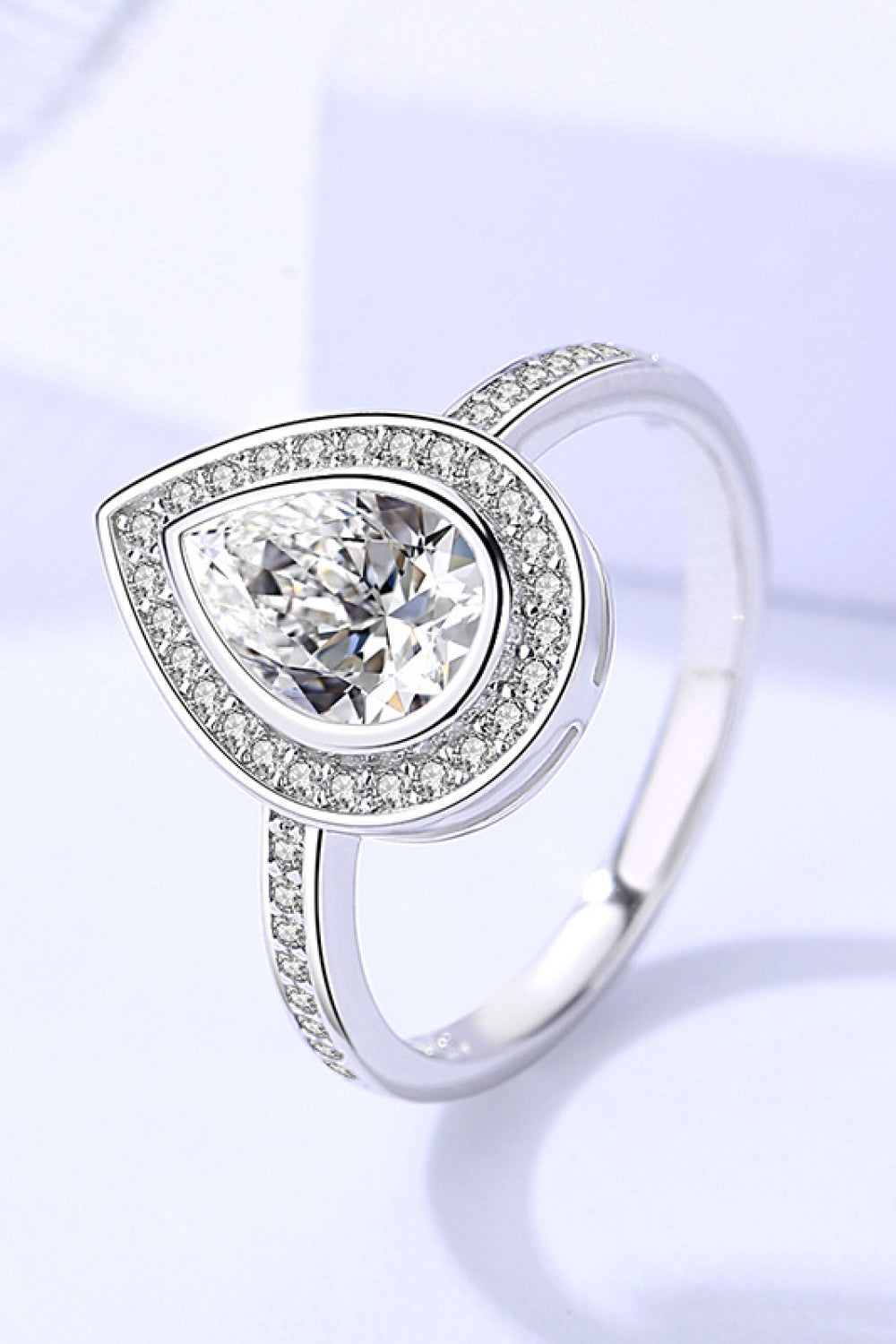 Bezeled Teardrop Moissanite Ring