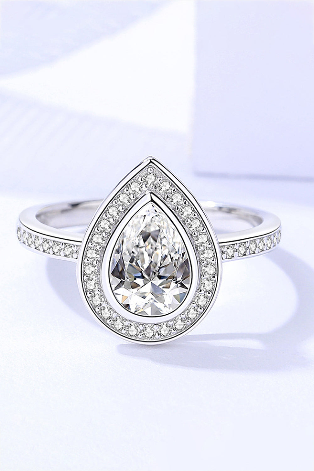 Bezeled Teardrop Moissanite Ring