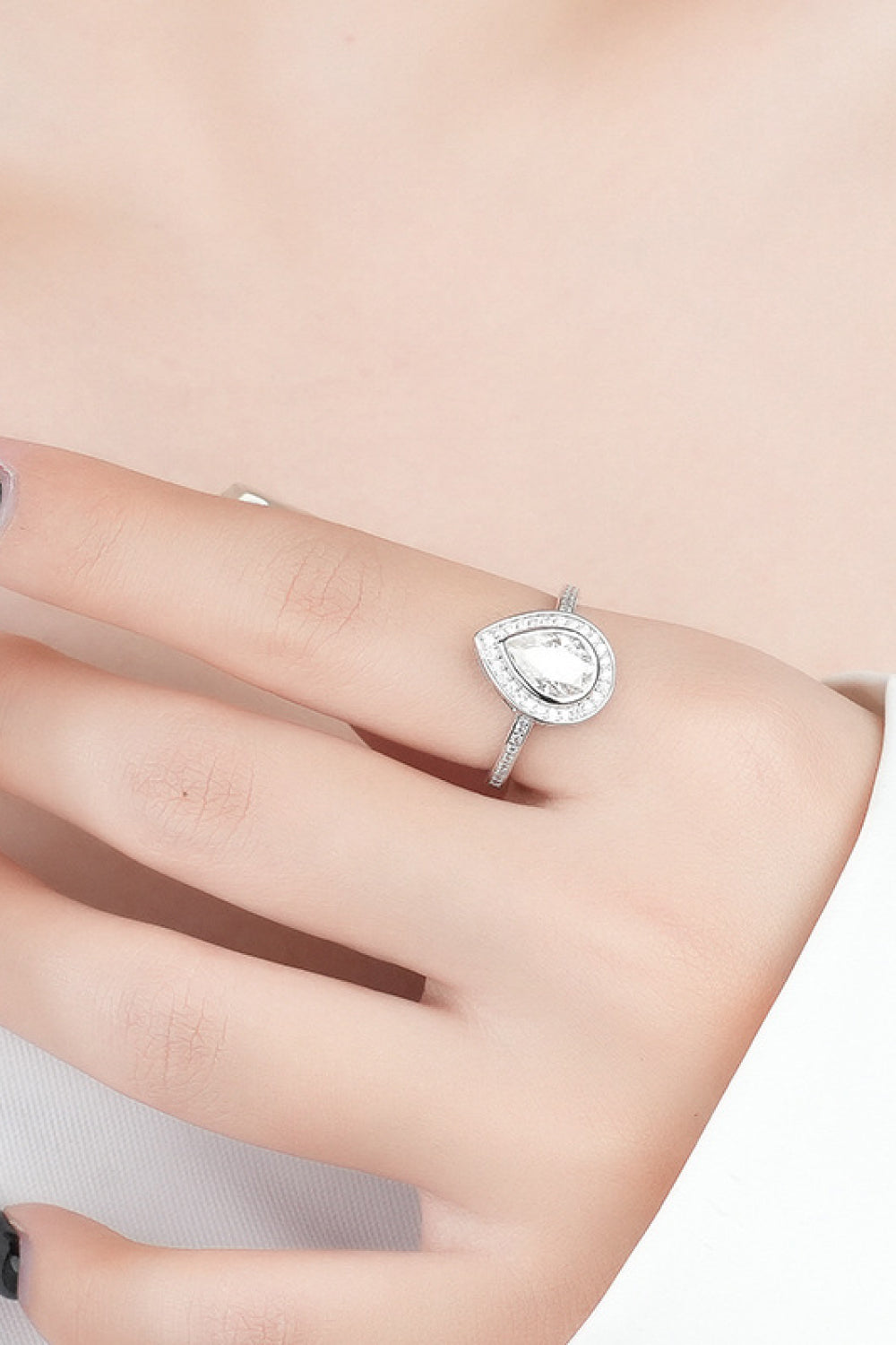 Bezeled Teardrop Moissanite Ring